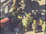 RAW VIDEO: Firefighers Rescue Driver From Crushed Vehicle