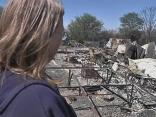 Residents Survey Wildfire Damage