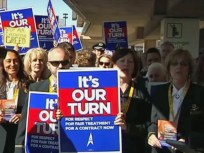 AA Flight Attendants Stage Mock Strike