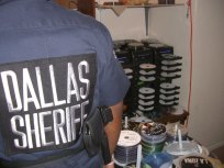Bootleg Raid Nets 10,000 Illegal Movies, CDs