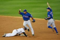 Rangers Hold Off Yankee Rally
