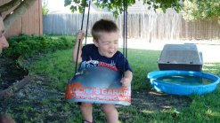 Caption This - Brayden in a Swing