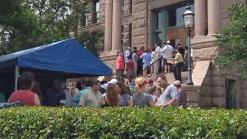 Hundreds of Buyers Flock to Buy Foreclosures