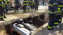 Vehicle Plunges Into Irving Creek
