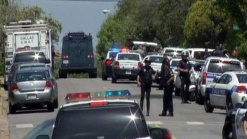Shooting Standoff Ends; Officer OK