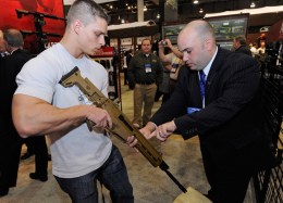 Fund to Sell Gunmaker, Cites Massacre