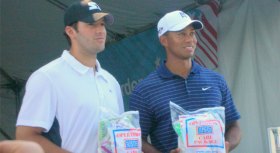 Tiger, Romo Pitch In For The Troops