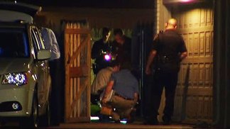 Woman Found Dead Behind Man's Home