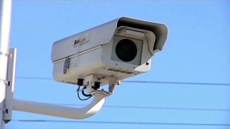 Cities Fight Red-Light Camera Money Grab Attempt
