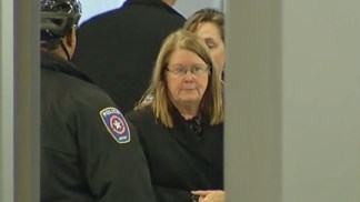 Raw Video: Woman Arrested With Gun at DFW Airport
