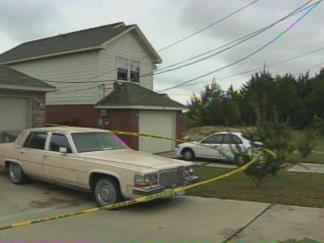 Man Arrested in Slayings of Wife, Stepdaughter
