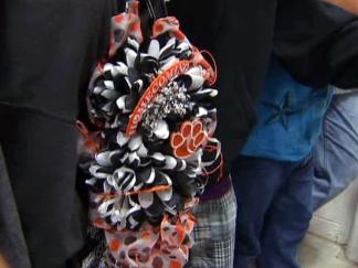 "It's Not Homecoming Without a Mum"