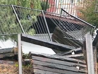 Rainfall Threatens House Where Backyard Washed Away