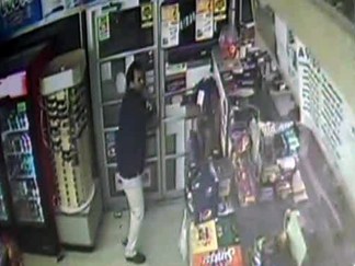 Store Owner With Pepsi Vs. Robber With Gun