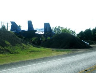Stealth Fighter Parked on Country Road