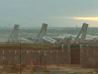 Fans Fill Red Lot to Watch Implosion