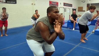 Yoga Heats Up Euless Trinity HS Football Practice