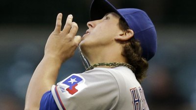 Holland Leads Rangers to Win Over Brewers