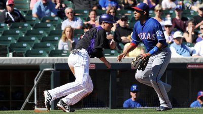Rockies Beat Rangers 9-1
