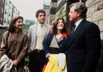 In a June 4, 1983 file photo John F. Kennedy Jr., second from left, listens to his uncle Ted Kennedy, right, with his mother Jacqueline Kennedy Onassis, left, and sister Caroline Kennedy, second right In a June 4, 1983 file photo John F. Kennedy Jr., second from left, listens to his uncle Ted Kennedy, right, with his mother Jacqueline Kennedy Onassis, left, and sister Caroline Kennedy, second right