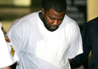 Onta Williams also known as Hamza is led by police officers from a federal building in New York, after being arrested by the FBI  on charges related to a plot to bomb targets in the Bronx.