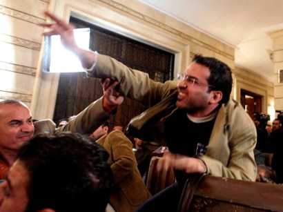 Iraqi journalist Muntadar al-Zaidi throws a shoe at President Bush during a new conference with Iraq Prime Minister Nouri al-Maliki in Baghdad last December. Iraqi journalist Muntadar al-Zaidi throws a shoe at President Bush during a new conference with Iraq Prime Minister Nouri al-Maliki in Baghdad last December.