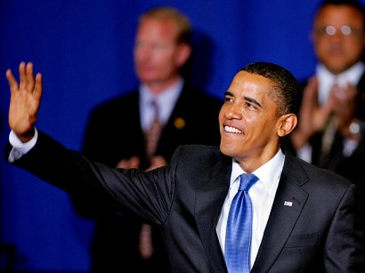 President Obama waves as he arrives at Portsmouth High School in Portsmouth, N.H., for Tuesday's town hall meeting on health care.