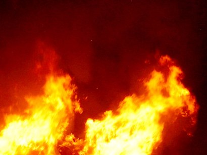 An elderly Dallas woman who was trying to keep warm is rescued by a neighbor after a fire breaks out inside her home, Dallas-Fire Rescue says.