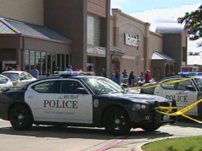 Police say a driver ran over a woman in a Walmart parking lot and then shot himself.
