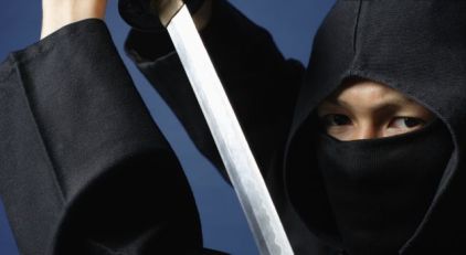 Man With Sword Slashes Another