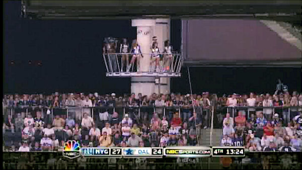 Cowboys Stadium Cage Dancers Will Shimmy Your Troubles Away