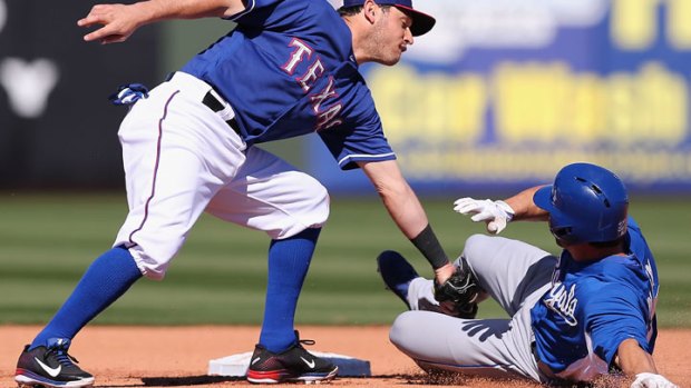 Royals, Rangers Tie at 5 in Spring Opener