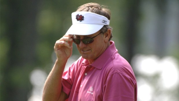 Steve Spurrier Doesn't Like Romo's Backwards Hat, Either