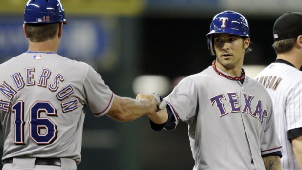 Wilson Hits, Pitches Rangers Past Astros