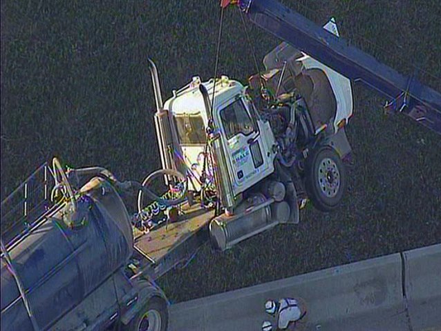 Big-Rig Dangles Off Overpass