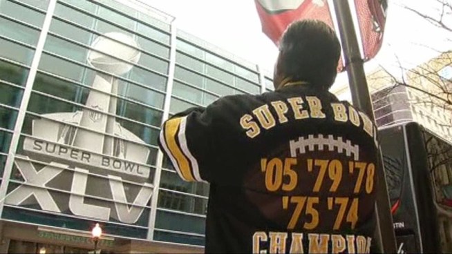 A big group of fans lined the street outside the <a title=