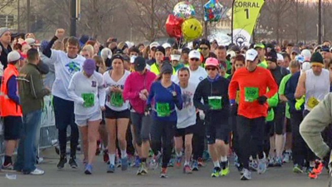 A group of military veterans is among the thousands who ran The Cowtown 2013.
