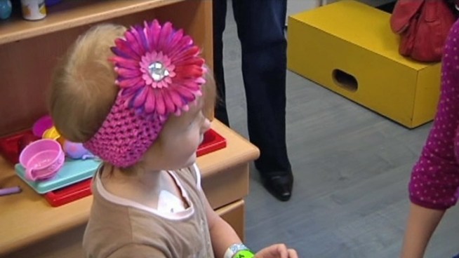 Mother-daughter team, along with friends, make bows to help boost the confidence of children fighting cancer. <a href=