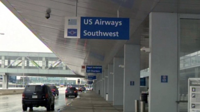 Taxiing Southwest planes touch wings at Detroit's Metro Airport.