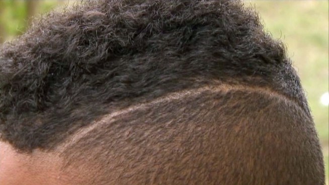 13-year-old Robert Blythe was put on in-school suspension because Mesquite ISD administrators say his haircut is too long.