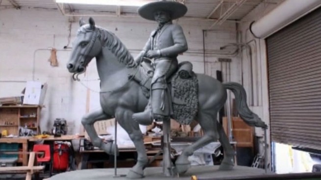 Vaquero de Fort Worth is coming soon to Fort Worth but there's a disagreement over the depictions of a sidearm that wasn't in the original plans.