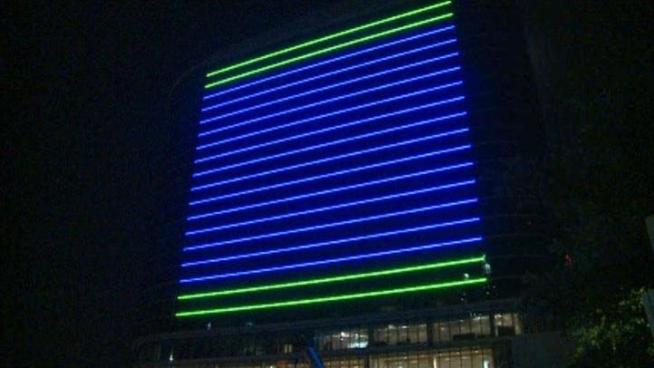 Several buildings in Downtown Dallas have blue lights to show support for the Mavericks. The entire side of the Omni hotel is covered in blue and green light.