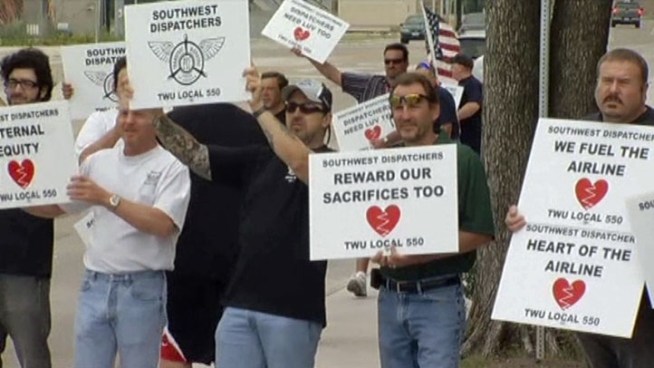 Southwest Airlines dispatchers picketed the company shareholder meeting Wednesday.