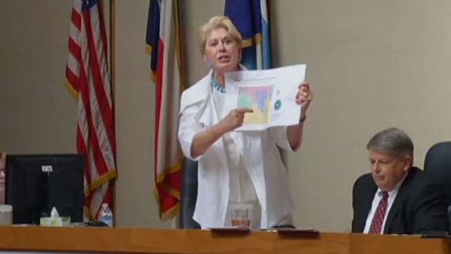 Dallas County Commissioner Maurine Dickey stormed out of Tuesday's meeting after blasting colleagues for a last minute redistricting map change that put another member in their place.