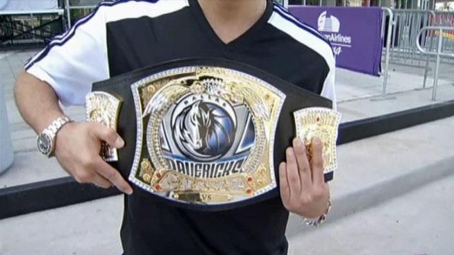 Dallas Mavericks fans took pictures with the man with the Mavs championship belt in Miami before Game 6.