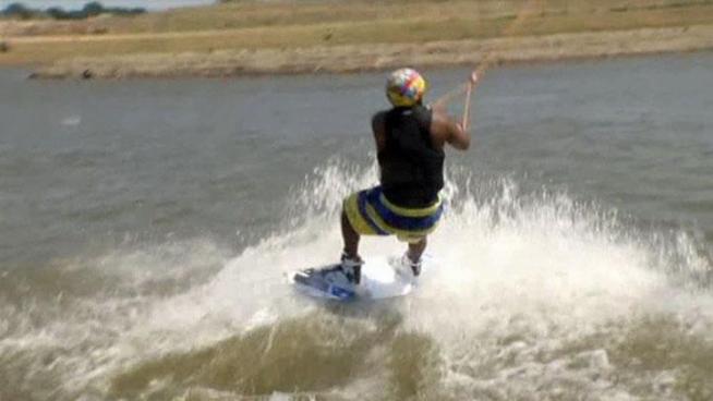 Hundreds of wakeboarders lined the edge of the new Cowtown Wakepark in order to take a free ride on the cable guided course.