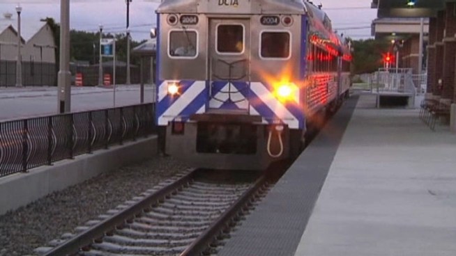 A new 21-mile passenger rail line dubbed the A-train is in service between Denton and the Dallas suburb of Carrollton, with the first trips before dawn Monday.