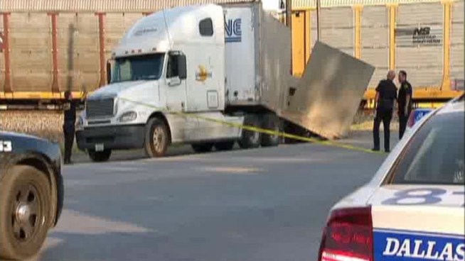 A train collided with the trailer of an 18-wheeler in the 5600 block of S. Lamar Street.