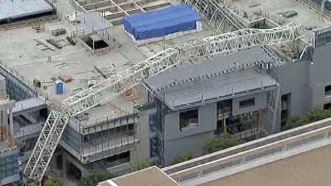 An all day operation (and likely into Monday) started early Sunday morning to remove a huge crane section by section off the UT Dallas campus.
