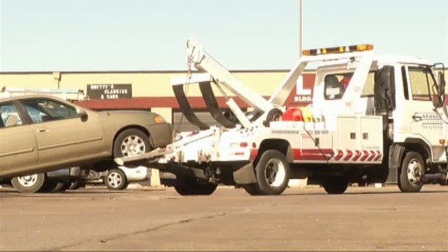 With more traffic, less parking, and more difficult weather conditions, tow and wrecker services have more to do.